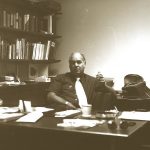 Bill Bentley at his desk at the Calgary YMCA