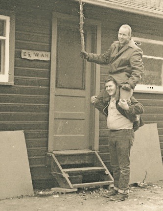 Ed Johnston aboard Bob Kelly at Winter Camp 1963. Killing roof rats?